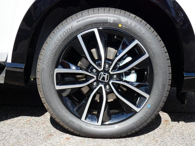 ヴェゼル ｅ：ＨＥＶ　Ｚ　登録済未使用車　９型ナビ　３６０°カメラ　ＥＴＣ２．０　後退出庫サポート　ＣＭＢＳ　ＡＣＣ　ＢＳＩ　アダプティブドライビングビーム　ＬＫＡＳ　ステアリングヒーター　ハンズフリーパワーバックドア（34枚目）