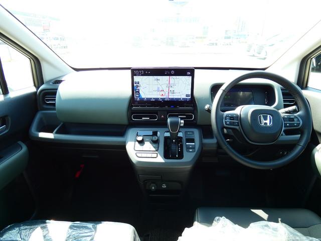 フリード e:HEVクロスター 登録済未使用車 360°カメラ 11.4型ナビ ACC 後退出庫サポート ADB LEDアクティブコーナリングライト ブラインドスポットインフォメーション フロアマット 地デジ DVD(2枚目)