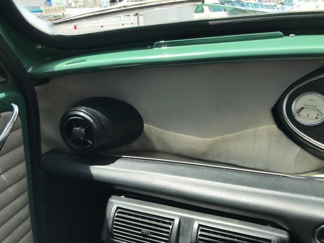 ＭＩＮＩ 　１．３ｉ　４速マニュアルシフト　同色ＮＥＷペイント　ＮＥＷルーフライナー　オーバーフェンダーレスＭｋ－ＩＩ仕様　センターメーター　１０インチホイール　前後Ｈｉ－Ｌｏキット　１年保証（18枚目）