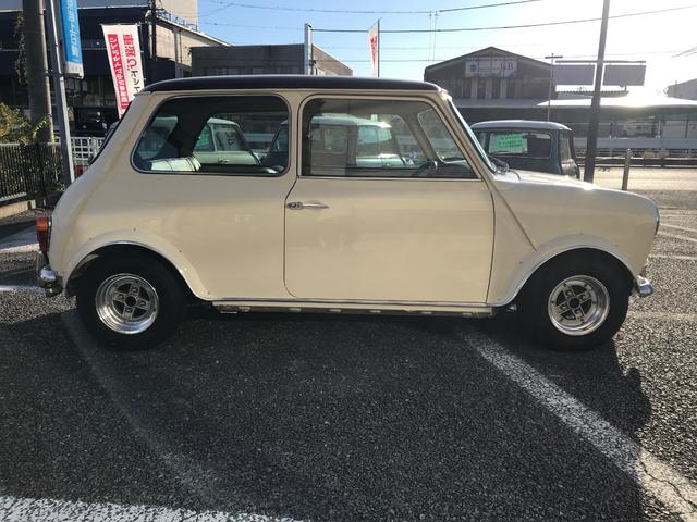 MINI メイフェア 4速マニュアルシフト 同色全塗装済みMk-I仕様 6Jオーバーフェンダー&Sスター10インチアルミ バルタンステンレスセンターマフラー 前後Hi-Loキット ナルディレザーステアリング 1年保証(4枚目)