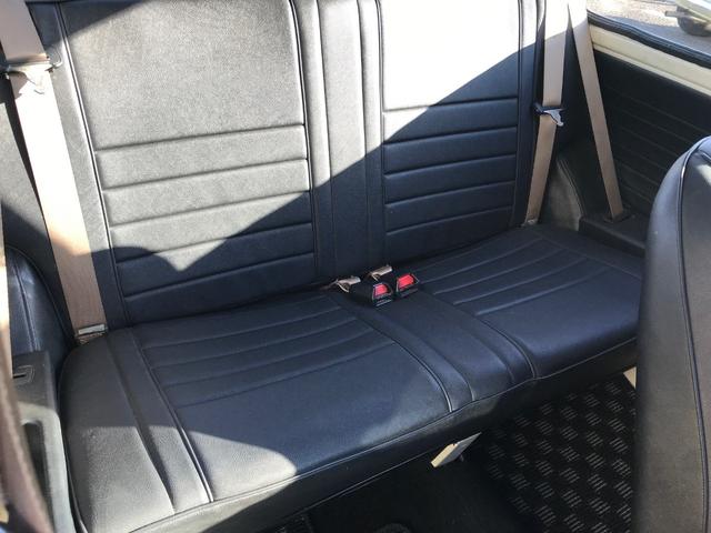 MINI メイフェア 4速マニュアルシフト 同色全塗装済みMk-I仕様 6Jオーバーフェンダー&Sスター10インチアルミ バルタンステンレスセンターマフラー 前後Hi-Loキット ナルディレザーステアリング 1年保証(28枚目)