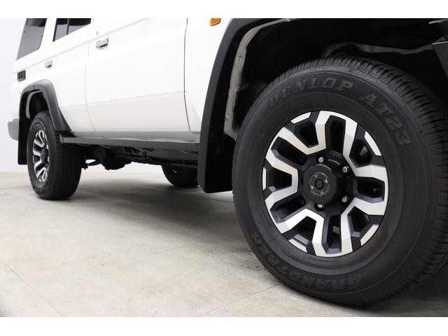 ランドクルーザー７０ ＡＸ　丸目ＬＥＤヘッドライト　電動デフロック　バックモニター内蔵自動防眩ミラー　純正１６インチアルミ　デュアルモードオートマチックロッキングハブ　アルミ製サイドステップ　トヨタセーフティセンス搭載　ＥＴＣ（25枚目）