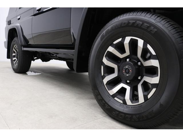 ランドクルーザー70 AX ワンオーナー 電動デフロック 丸目LEDヘッドライト 純正ナビ バックカメラ内蔵防眩ミラー 木目調ステアリング 純正16インチAW サイドバイザー 前後ドラレコ トヨタセーフティーセンス搭載(18枚目)