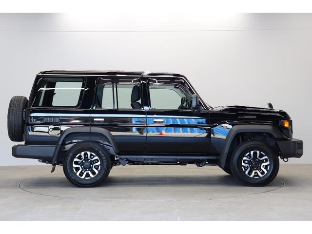 ランドクルーザー７０ ＡＸ　電動デフロック　丸目ＬＥＤヘッドライト　純正ナビ　バックカメラ内蔵防眩ミラー　ワンオーナー　木目調ステアリング　純正１６インチＡＷ　サイドバイザー　前後ドラレコ　トヨタセーフティーセンス搭載（7枚目）