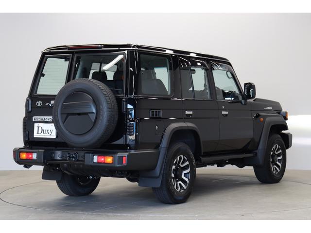 ランドクルーザー７０ ＡＸ　電動デフロック　丸目ＬＥＤヘッドライト　純正ナビ　バックカメラ内蔵防眩ミラー　ワンオーナー　木目調ステアリング　純正１６インチＡＷ　サイドバイザー　前後ドラレコ　トヨタセーフティーセンス搭載（30枚目）