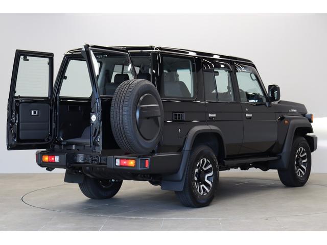 ランドクルーザー７０ ＡＸ　電動デフロック　丸目ＬＥＤヘッドライト　純正ナビ　バックカメラ内蔵防眩ミラー　ワンオーナー　木目調ステアリング　純正１６インチＡＷ　サイドバイザー　前後ドラレコ　トヨタセーフティーセンス搭載（34枚目）