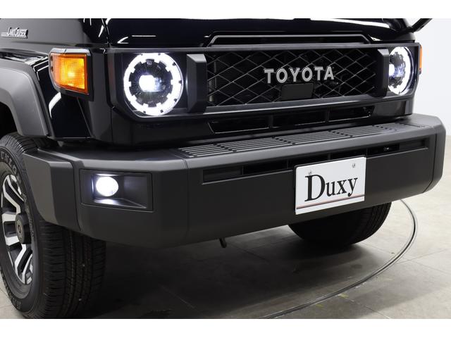 ランドクルーザー７０ ＡＸ　登録済み未使用車　丸目ＬＥＤヘッドライト　電動デフロック　クルーズコントロール　バックモニター内臓自動防眩ミラー　純正１６インチアルミホイール　アルミ製サイドステップ　トヨタセーフティセンス搭載（22枚目）