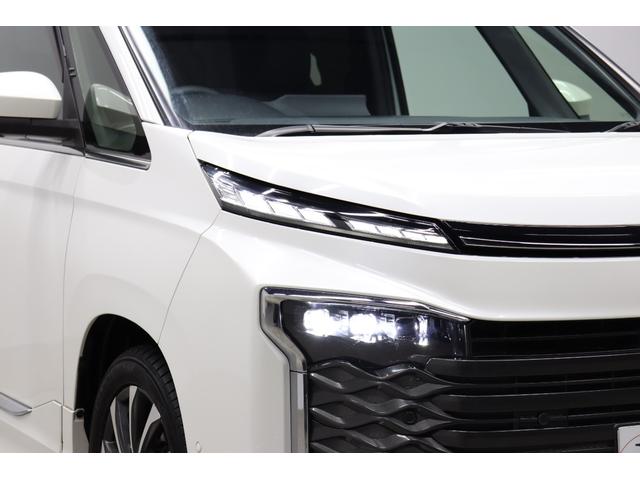 ヴォクシー Ｓ－Ｚ　モデリスタエアロ　１０．５型ナビ　１４型後席ＴＶ　デジタルキー　ＤＶＤデッキ　前後ドラレコ　全方位モニター　ブラインドスポットモニター　ハンズフリー電動スライド　電動バックドア　後席オットマン（13枚目）