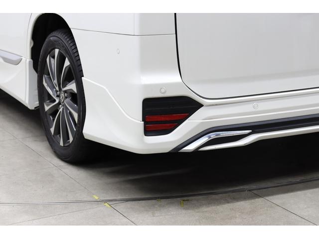 ヴォクシー Ｓ－Ｚ　モデリスタエアロ　１０．５型ナビ　１４型後席ＴＶ　デジタルキー　ＤＶＤデッキ　前後ドラレコ　全方位モニター　ブラインドスポットモニター　ハンズフリー電動スライド　電動バックドア　後席オットマン（33枚目）