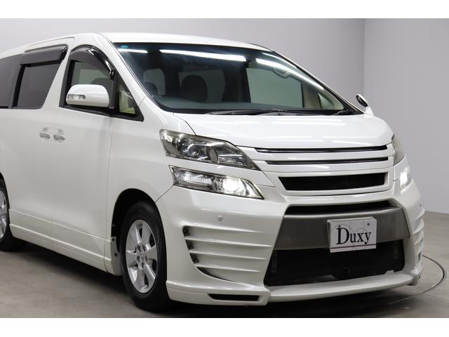 ヴェルファイア ２．４Ｘ　社外エアロ　カロッツェリアナビ　バックカメラ　フロントビューカメラ　ＨＩＤヘッドランプ　後席モニター　革調シートカバー　レーダー探知機　前後ドライブレコーダー　ＥＴＣ　木目インパネ取付　純正アルミ（12枚目）