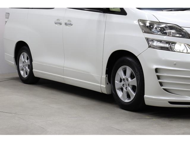 ヴェルファイア ２．４Ｘ　社外エアロ　カロッツェリアナビ　バックカメラ　フロントビューカメラ　ＨＩＤヘッドランプ　後席モニター　革調シートカバー　レーダー探知機　前後ドライブレコーダー　ＥＴＣ　木目インパネ取付　純正アルミ（21枚目）