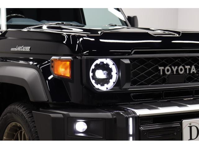 ランドクルーザー７０ ＡＸ　モデリスタ１８インチアルミ　モデリスタエアロ　フロントバンパーガーニュッシュ　ＪＡＯＳアンダーカバー　純正７インチナビ　バックモニター内臓自動防眩ミラー　丸目ＬＥＤヘッドライト　電動デフロック　ＥＴＣ（13枚目）