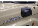 ＡＸ　丸目ＬＥＤヘッドライト　電動デフロック　バックモニター内蔵自動防眩ミラー　純正１６インチアルミホイール　デュアルモードオートマチックロッキングハブ　アルミ製サイドステップ　トヨタセーフティセンス搭載（39枚目）