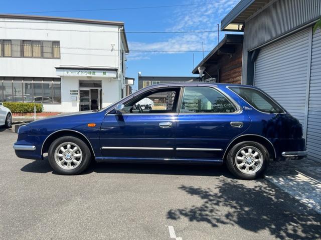 インプレッサスポーツワゴン 　１．５　カサブランカ　ワンオーナー　限定車　ＭＩＮＩＬＩＴＥ１４インチ５穴アルミホイール　（ダークブルー）（4枚目）