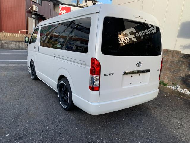 ハイエースワゴン ＧＬ　ガレージフジコンプリートＸ３床張り車中泊ベットシートカバーＬＥＤ照明パワースライドドアＬＥＤヘッド地デジナビＴＶデジタルインナーミラーパノラマビューモニターローダウン・スポイラー１６アルミホイール（4枚目）