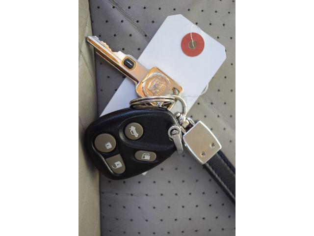 キャデラックセビル ツーリングセダンＳＴＳ　ディーラー車　３２Ｖノーススターエンジン　サンルーフ　ベージュレザーシート　両席シートヒーター　パワーシート　ＢＯＳＥサウンド　ダッシュマット付　１６インチアルミホイール　キーレス（53枚目）