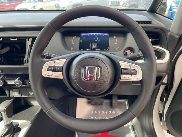 フィット ホーム　登録済未使用車　衝突被害軽減ブレーキ　スマートキー　コーナーセンサー　ＬＥＤヘッドライト　ディスプレイオーディオ　アダクティブクルーズコントロール　バックカメラ　電動格納ドアミラー　オートエアコン（15枚目）