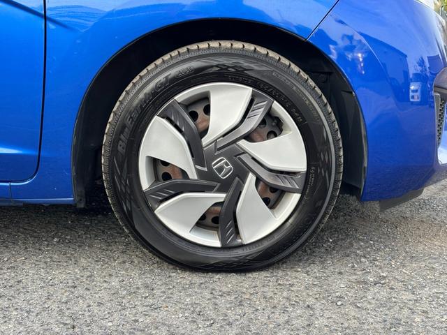 フィットハイブリッド Lパッケージ 純正ナビ・バックカメラ・Bluetooth・HDMI・スマートキー・ETC(28枚目)