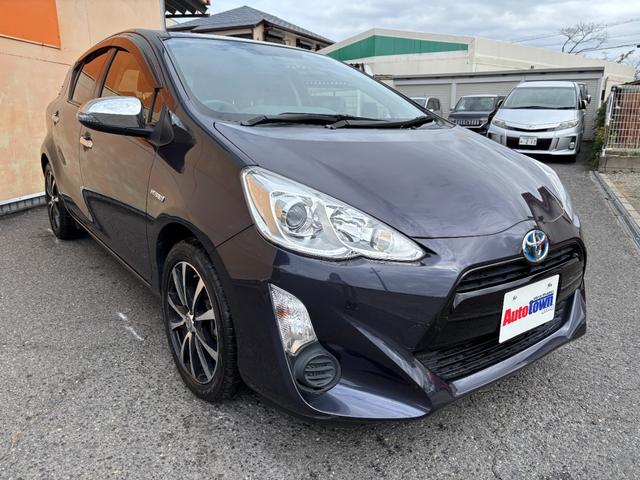 アクア Ｇブラックソフトレザーセレクション　純正ＳＤナビ　Ｂｌｕｅｔｏｏｔｈオーディオバック　モニター　地デジ　フルセグＴＶ　ＣＤ再生　ＤＶＤ再生　ＥＴＣ車載器　スマートキー×２　１６インチ社外アルミホイール（6枚目）