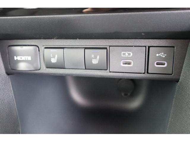 ヤリスクロス ハイブリッドＺ　登録済未使用車／純正ナビＴＶ＆全方位カメラ＆ＥＴＣ／チームメイト／ハンズフリーパワーＢドア／レーダーＣ／黒革コンビＳ＆パワーＳ＆シートＨ／ステアＨ／ＬＥＤヘッド／スマートキー／コーナーＳ／純正１８ＡＷ（35枚目）