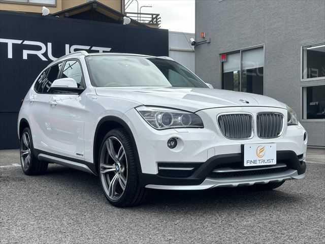 Ｘ１ ｓＤｒｉｖｅ　２０ｉ　ｘライン　ＨＤＤナビ　バックカメラ　ＨＩＤヘッドライト　フルセグＴＶ　純正１９インチアルミホイール　禁煙車　ハーフレザーシート　ＭＴモード付シフト　ＥＴＣ　ルーフレール　アイドリングストップ　スマートキー（14枚目）