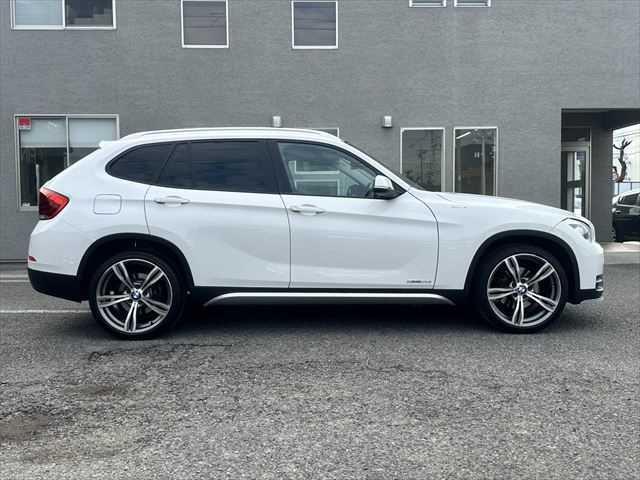 Ｘ１ ｓＤｒｉｖｅ　２０ｉ　ｘライン　ＨＤＤナビ　バックカメラ　ＨＩＤヘッドライト　フルセグＴＶ　純正１９インチアルミホイール　禁煙車　ハーフレザーシート　ＭＴモード付シフト　ＥＴＣ　ルーフレール　アイドリングストップ　スマートキー（15枚目）