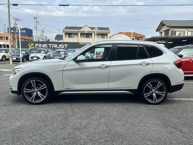 Ｘ１ ｓＤｒｉｖｅ　２０ｉ　ｘライン　ＨＤＤナビ　バックカメラ　ＨＩＤヘッドライト　フルセグＴＶ　純正１９インチアルミホイール　禁煙車　ハーフレザーシート　ＭＴモード付シフト　ＥＴＣ　ルーフレール　アイドリングストップ　スマートキー（19枚目）