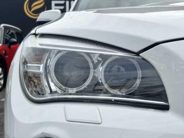 Ｘ１ ｓＤｒｉｖｅ　２０ｉ　ｘライン　ＨＤＤナビ　バックカメラ　ＨＩＤヘッドライト　フルセグＴＶ　純正１９インチアルミホイール　禁煙車　ハーフレザーシート　ＭＴモード付シフト　ＥＴＣ　ルーフレール　アイドリングストップ　スマートキー（21枚目）