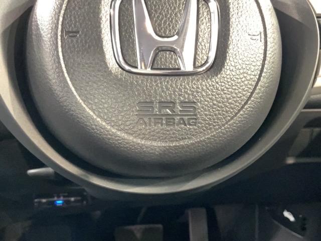 フィット e:HEVホーム H SENSING 新車保証 試乗車 ワンオ-ナ- ナビVXU-245FTi TV Rカメラ BTオ-ディオ ETC LEDライト VSA クルコン スマ-トキ- スペアキ- 盗難防止装置 整備記録簿(22枚目)