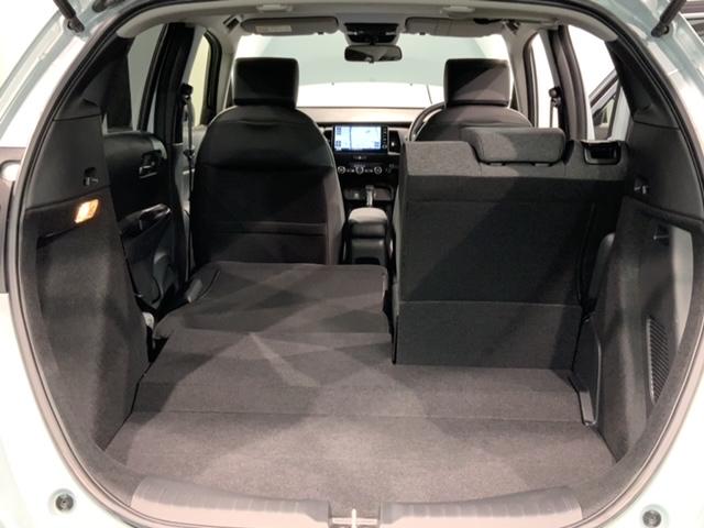 フィット e:HEVホーム H SENSING 新車保証 試乗車 ワンオ-ナ- ナビVXU-245FTi TV Rカメラ BTオ-ディオ ETC LEDライト VSA クルコン スマ-トキ- スペアキ- 盗難防止装置 整備記録簿(39枚目)