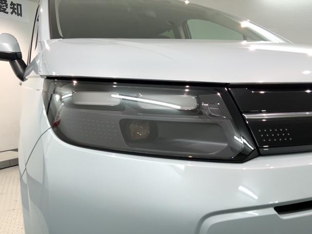 フリード エアーＥＸ　Ｈ　ＳＥＮＳＩＮＧ　新車保証　試乗車　ワンオーナー　ナビＬＸＭ－２４２ＺＦＮｉ　ＴＶ　Ｒカメラ　ＢＴオ－ディオ　ＥＴＣ　ＬＥＤライト　ＶＳＡ　両側電動ドア　シートヒーター　クルコン　アルミ　フォグ（8枚目）