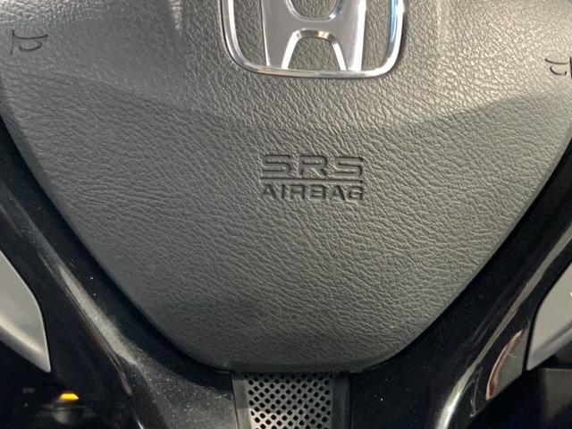 フィットハイブリッド ＲＳ　１年保証　ナビ　ＴＶ　Ｒカメラ　ＤＶＤ　ＥＴＣ　ＨＩＤ　ＶＳＡ　クルコン　アルミ　スマ－トキ－　スペアキ－　盗難防止装置　整備記録簿　ドアバイザ－　Ｗエアバッグ　ＡＡＣ　スマキ－　Ｂカメ　キーフリー（22枚目）