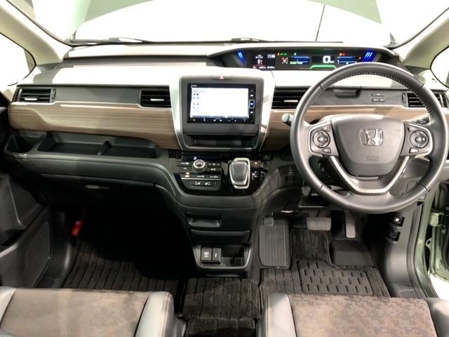 フリードハイブリッド ハイブリッド・クロスター HSENSING 最長5年保証 ワンオ-ナ- ナビVXM-234VFI TV Rカメラ CD録音 BTオーディオ DVD ドラレコ ETC LEDライト フォグライト VSA 両側電動シ-トヒ-タ-(9枚目)