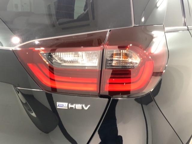 フィット ｅ：ＨＥＶホーム　タバコ臭有　Ｈ　ＳＥＮＳＩＮＧ　最長５年保証　ワンオ－ナ－　ナビＶＸＵ－２１５ＦＴｉ　ＴＶ　Ｒカメラ　ＣＤ録音　ＢＴオ－ディオＤＶＤ　ＥＴＣ　ＬＥＤライト　ＶＳＡ　クルコン　スマ－トキ－　盗難防止装置（45枚目）