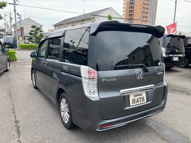 ステップワゴンスパーダ Ｓ　純正ナビＴＶ　ＥＴＣ　ＤＶＤ再生　キーレスキー　左側パワースライド　１００Ｖ電源　純正アルミホイール　パドルシフト　ＨＩＤヘッドライト　３ｒｄシート収納可（12枚目）