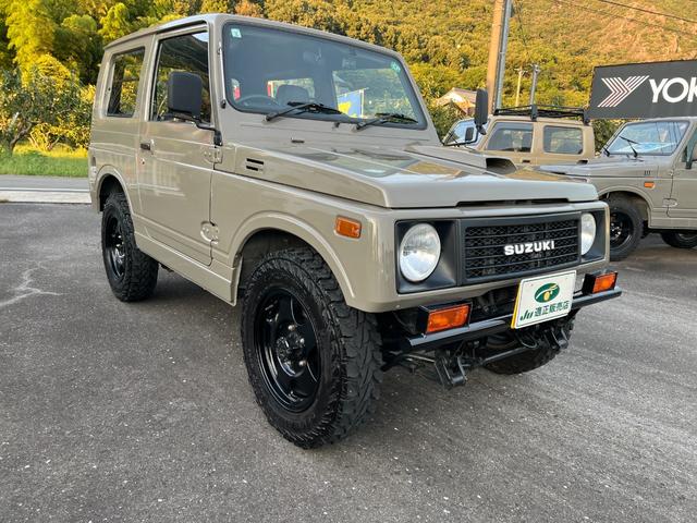 ジムニー ワイルドウインドリミテッド　ＪＡ１１－３型アッシュカーキ全塗装　圧縮圧力測定済　ＴベルトＷポンプ交換　前後ブラックバンパーナンバー移動　皮調シートカバー　ＡＷ塗装　ジオランダー　天井加工済（2枚目）