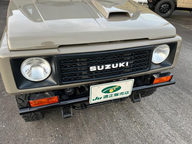 ジムニー ワイルドウインドリミテッド　ＪＡ１１－３型アッシュカーキ全塗装　圧縮圧力測定済　ＴベルトＷポンプ交換　前後ブラックバンパーナンバー移動　皮調シートカバー　ＡＷ塗装　ジオランダー　天井加工済（15枚目）