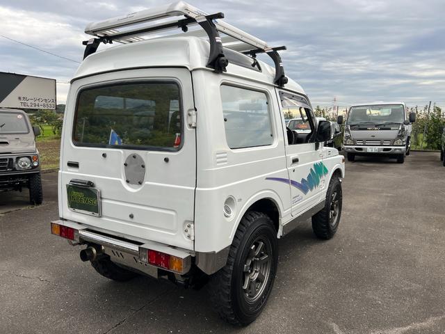 ジムニー EC JA11-2型 圧縮圧力測定済パノラマハイルーフ2インチボディーリフト検対応 前後ステンバンパー ナンバー移動 検対応マフラー MTタイヤ社外アルミ キングピンOH済クラッチOH付TベルトWポンプ交換(5枚目)