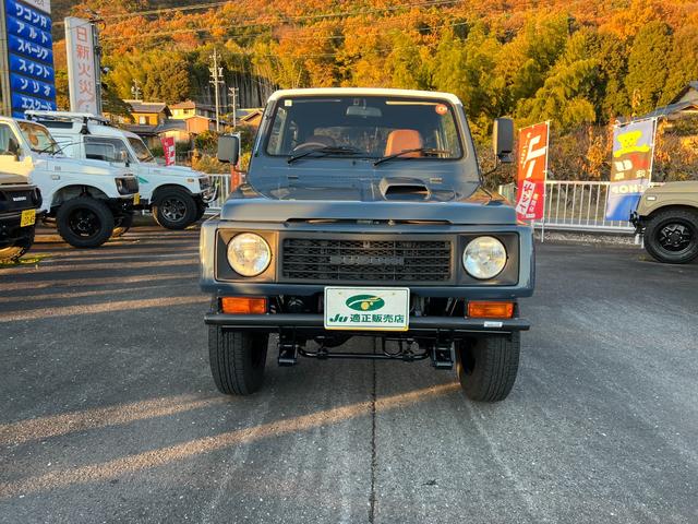ジムニー ランドベンチャー　ＪＡ１１－５型最終ブルーツートン全塗装　　圧縮圧力測定済　ＴベルトＷポンプ交換済　フロントタニグチＢＰ　ホイル塗装　ジオランダーＡＴ　ナルディーウッドＣＤ　ＥＴＣ　皮調シートカバー（4枚目）