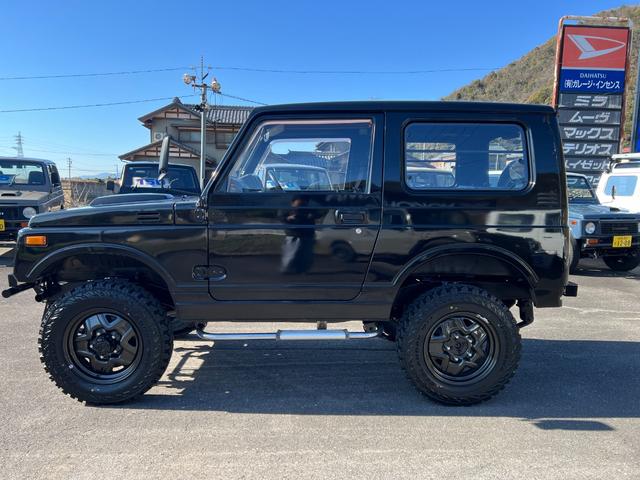 ジムニー スコットリミテッド　ＪＡ１１Ｖ改３インチリフト公認車検対応車輛　圧縮圧力測定済　前後ブラックバンパー　ナンバー移動　ホイル塗装ジオランダー１８５－８５－１６新品　社外ハンドル　タンクガード　検対応マフラー皮調シートカバー（8枚目）