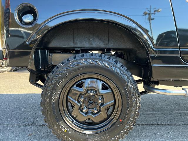 ジムニー スコットリミテッド　ＪＡ１１Ｖ改３インチリフト公認車検対応車輛　圧縮圧力測定済　前後ブラックバンパー　ナンバー移動　ホイル塗装ジオランダー１８５－８５－１６新品　社外ハンドル　タンクガード　検対応マフラー皮調シートカバー（18枚目）