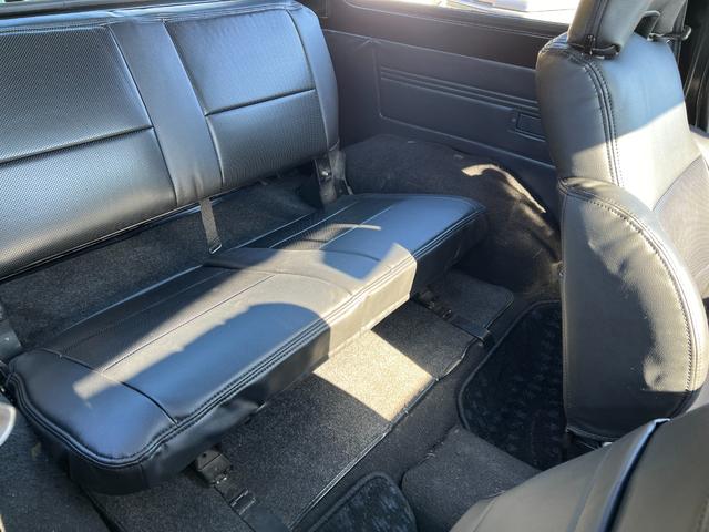 ジムニー スコットリミテッド　ＪＡ１１Ｖ改３インチリフト公認車検対応車輛　圧縮圧力測定済　前後ブラックバンパー　ナンバー移動　ホイル塗装ジオランダー１８５－８５－１６新品　社外ハンドル　タンクガード　検対応マフラー皮調シートカバー（24枚目）