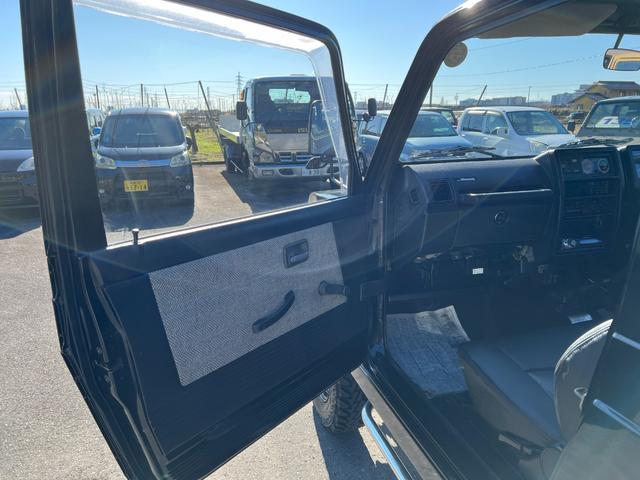 ジムニー スコットリミテッド　ＪＡ１１Ｖ改３インチリフト公認車検対応車輛　圧縮圧力測定済　前後ブラックバンパー　ナンバー移動　ホイル塗装ジオランダー１８５－８５－１６新品　社外ハンドル　タンクガード　検対応マフラー皮調シートカバー（34枚目）