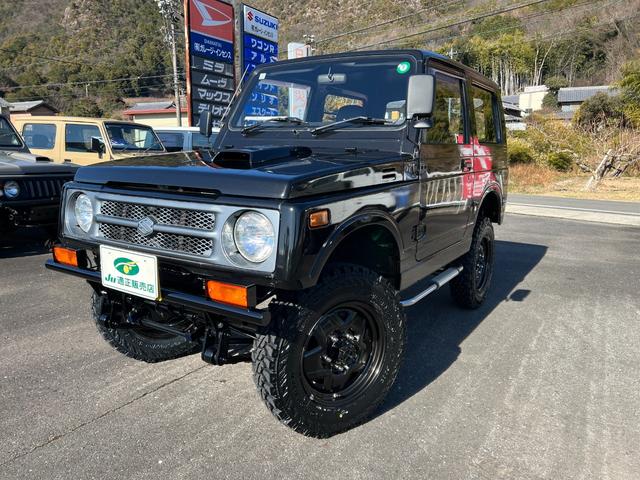 ジムニー スコットリミテッド　ＪＡ１１Ｖ改３インチリフト公認車検対応車輛　圧縮圧力測定済　前後ブラックバンパー　ナンバー移動　ホイル塗装ジオランダー１８５－８５－１６新品　社外ハンドル　タンクガード　検対応マフラー皮調シートカバー（41枚目）