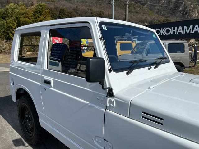 ジムニー ＨＣ　ＪＡ１１－４型Ｔベルト交換済　圧縮圧力測定済　前後ブラックバンパー　ナンバー移動　皮調シートカバー　ホイル塗装　ジオランダー新品（10枚目）