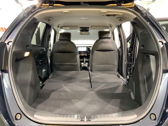 e:HEVホーム Honda SENSING 新車保証 試乗禁煙車 ナビ カーテンエアバッグ TVナビ イモビ 横滑防止 DVD再生 アルミホイール ミュージックプレイヤー接続可 キーフリー クルーズコントロール CD(38枚目)