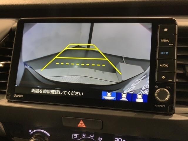 フィット ｅ：ＨＥＶホーム　ＨＳＥＮＳＩＮＧ　新車保証　試乗車　ワンオ－ナ－　前後誤発進抑制機能　助手席エアバッグ　運転席エアバッグ　１オナ　ＬＥＤライト　ＵＳＢ接続　バックカメラ　ＡＢＳ　サイドエアバッグ　フルセグＴＶ　記録簿（7枚目）
