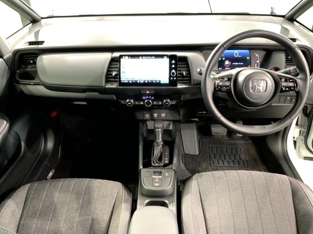 フィット e:HEVホームブラックスタイル H SENSING 新車保証 試乗車 ワンオーナー 純正ナビ TV Rカメラ マルチビュー BTオ-ディオ ETC LEDライト VSA クルコン アルミ スマートキー 盗難防止装置 整備記録簿(9枚目)