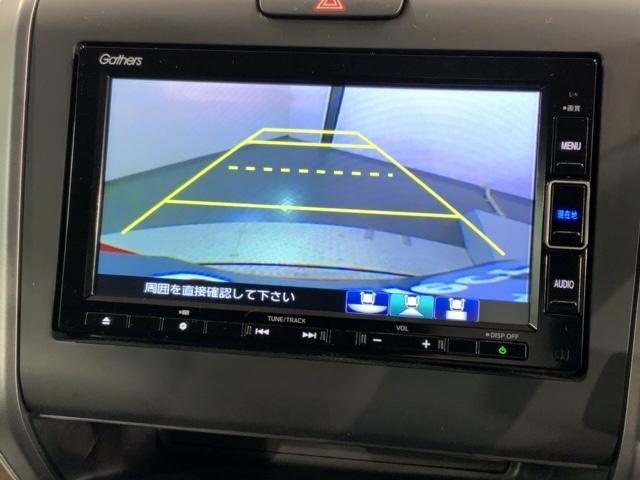 フリード Ｇ・ホンダセンシング　最長５年保証　ワンオ－ナ－　ナビＶＸＭ－２１４ＶＦｉ　ＴＶ　Ｒカメラ　ＣＤ録音　ＢＴオ－ディオ　ＤＶＤ　ＥＴＣ　両側電動ドア　ＶＳＡ　スマ－トキ－　スペアキー　盗難防止装置　整備記録簿　ドアバイザ－（7枚目）