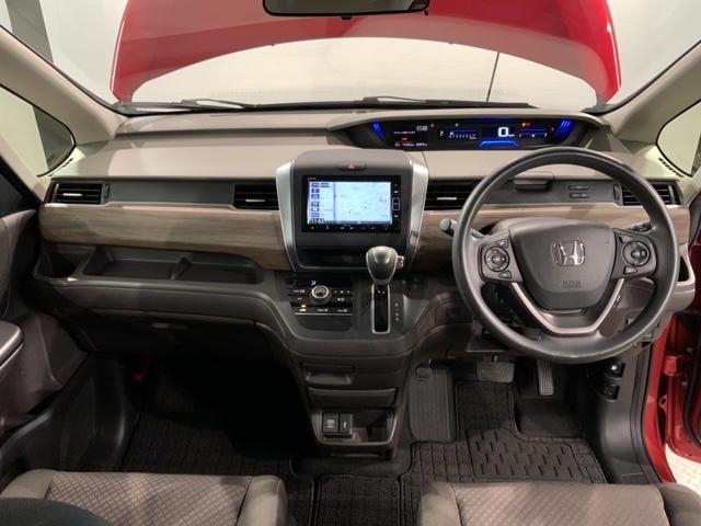 フリード Ｇ・ホンダセンシング　最長５年保証　ワンオ－ナ－　ナビＶＸＭ－２１４ＶＦｉ　ＴＶ　Ｒカメラ　ＣＤ録音　ＢＴオ－ディオ　ＤＶＤ　ＥＴＣ　両側電動ドア　ＶＳＡ　スマ－トキ－　スペアキー　盗難防止装置　整備記録簿　ドアバイザ－（9枚目）